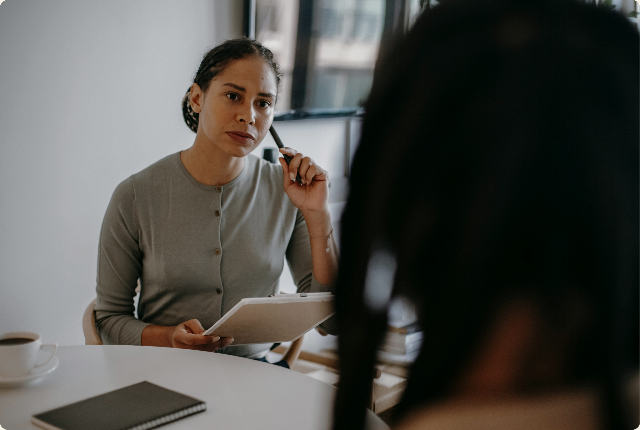 Professional conducting an assessment