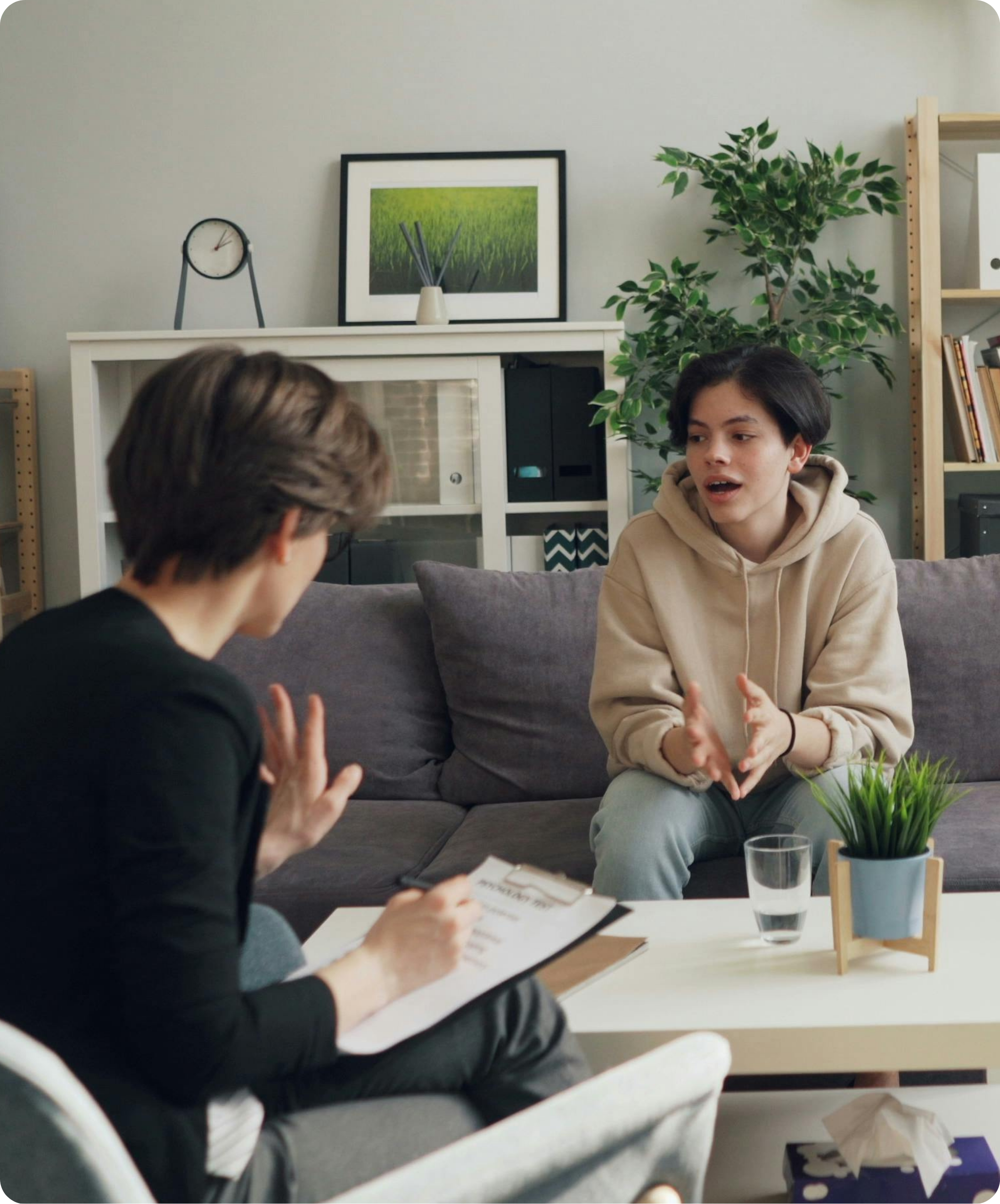 Therapist talking with client
